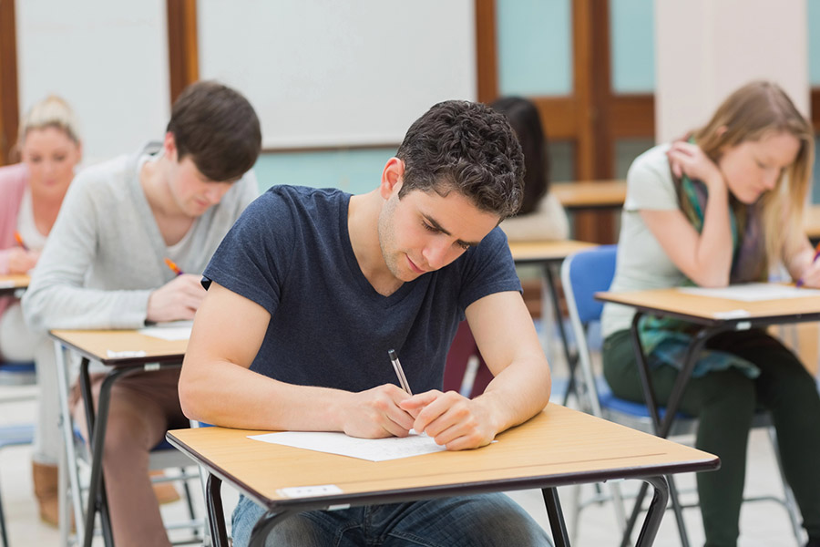 Students taking a test in a classroom in Kansascity